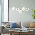 5 Light Chandelier with Frosted Glass Globe Bulbs gold-iron