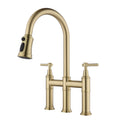 Bridge Kitchen Faucet with Pull Down Sprayhead in Spot gold-brass