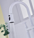 Bridge Kitchen Faucet with Pull Down Sprayhead in Spot white-brass