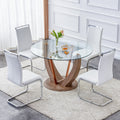 A modern minimalist circular tempered glass dining transparent-glass