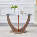 A modern minimalist circular tempered glass dining transparent-glass