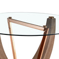 A modern minimalist circular tempered glass dining transparent-glass